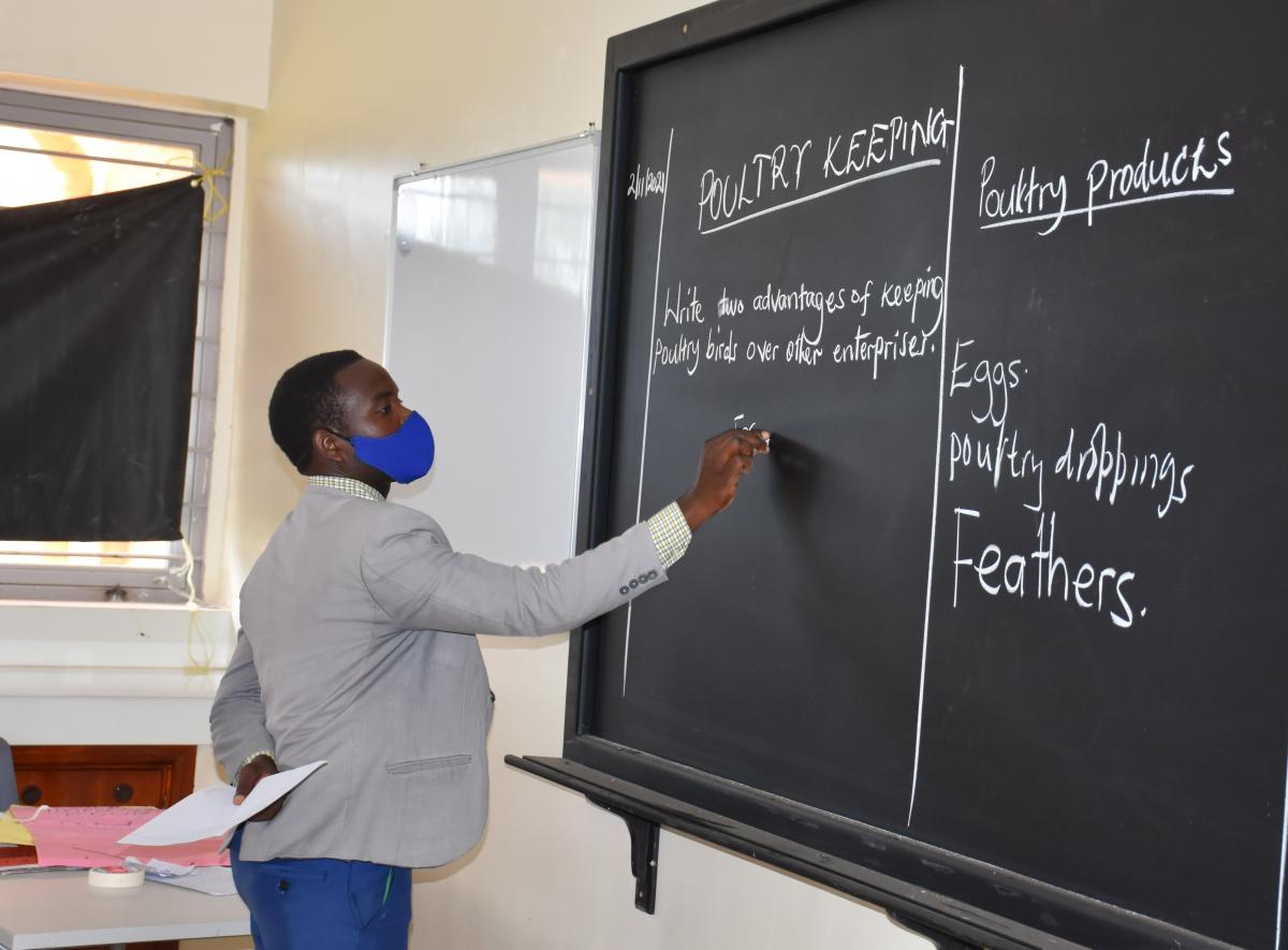 A teacher in a Ugandan classroom